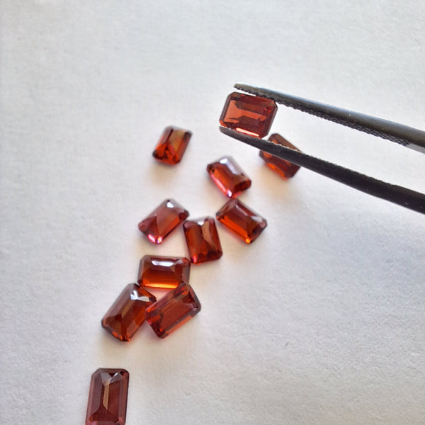 6x4mm garnet stone in tweezer Cape diamond exchange Cape town