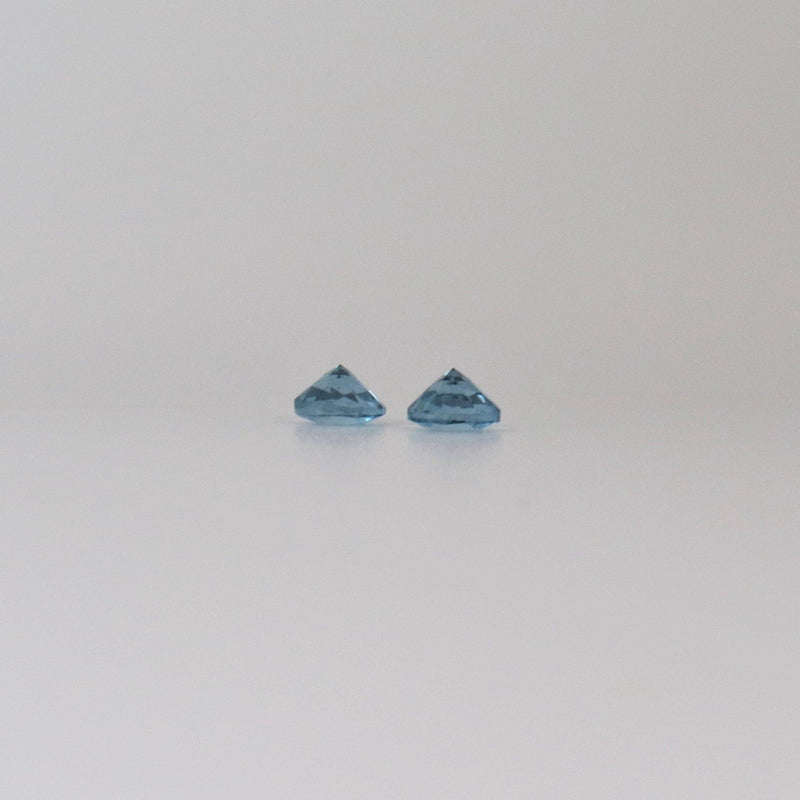 4mm Round Santa Maria Aquamarine Stone with bottom view - cape diamond exchange