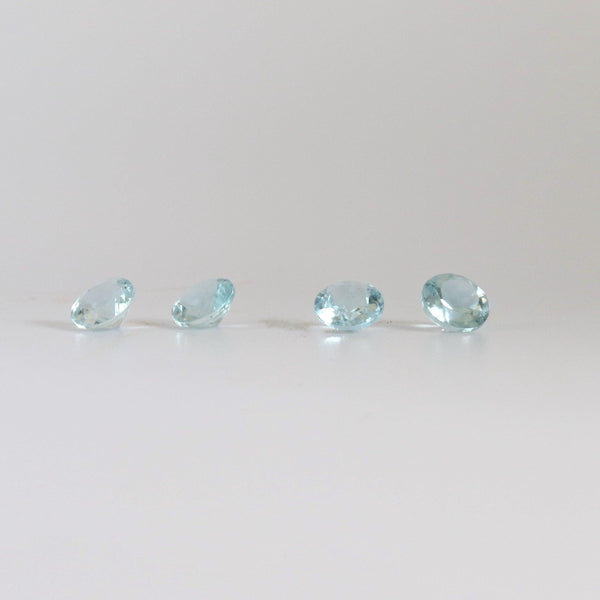 5.1mm Round Aquamarine Stone with front view - cape diamond exchange