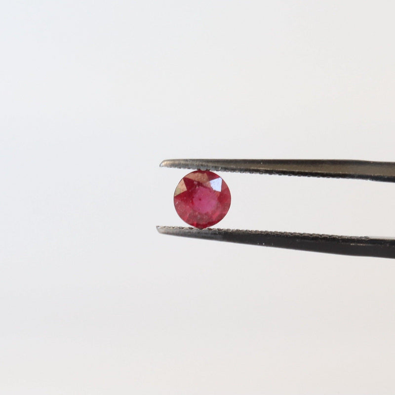 5.2mm Round Ruby Stone with front view - cape diamond exchange