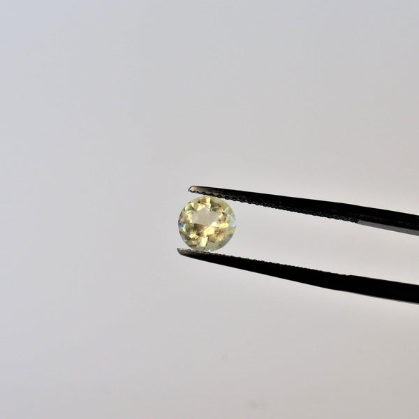 6.3mm Round Golden Beryl Stone with front view - cape diamond exchange