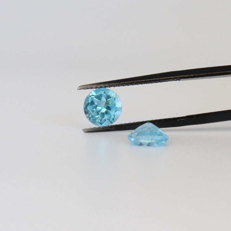 7.1mm Round Blue Topaz (Pair) with front and back view  - cape diamond exchange