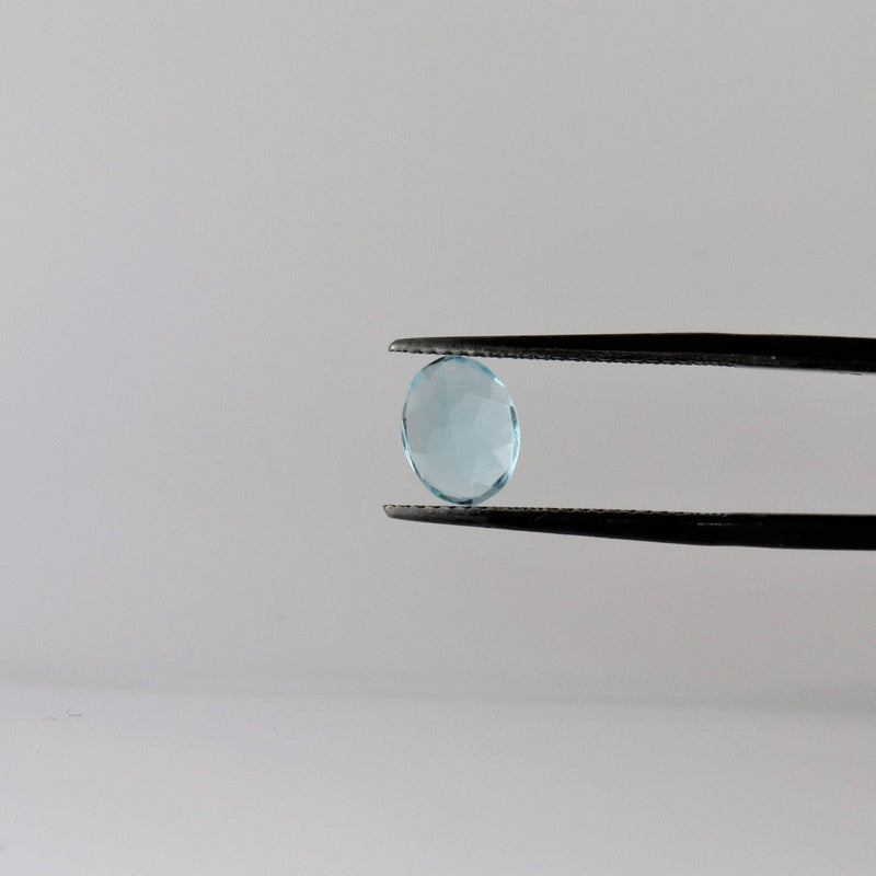 6.5mm x 8.1mm Oval Aquamarine Stone with front view - cape diamond exchange