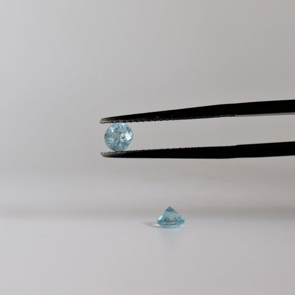 4.1mm Round Aquamarine Stone with front view - cape diamond exchange