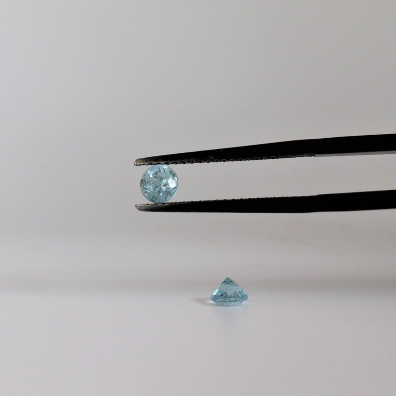 4.1mm Round Aquamarine Stone with front view - cape diamond exchange