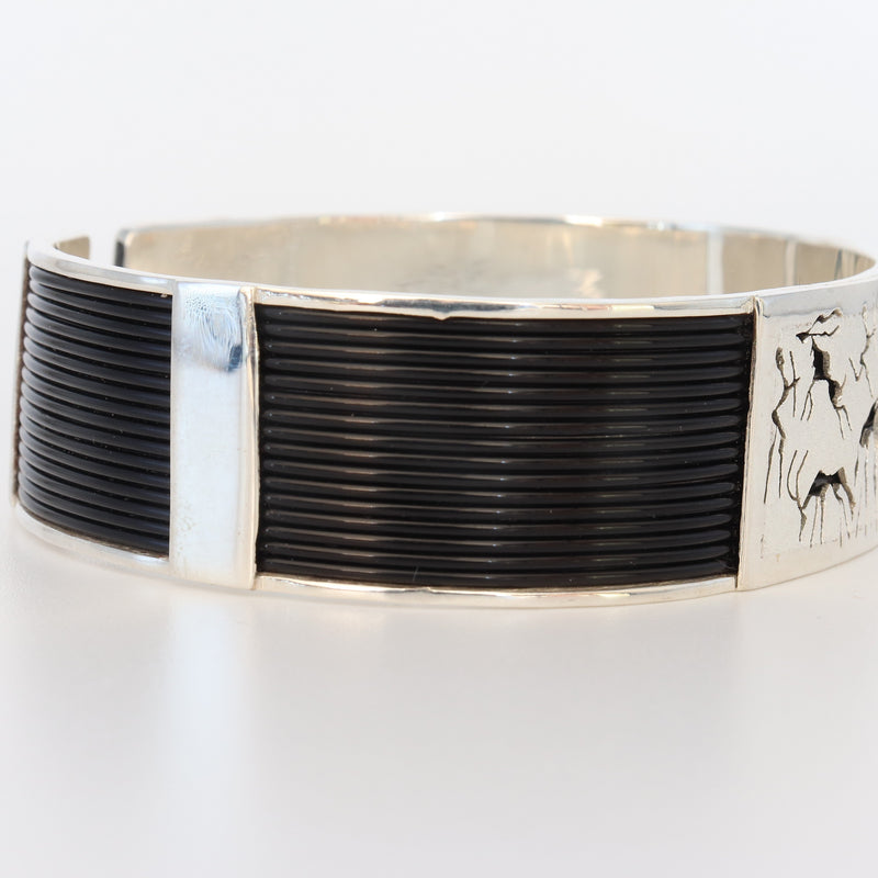 Silver elephant hair rock-art giraffe and bushmen bangle-Cape diamond Exchange Cape Town