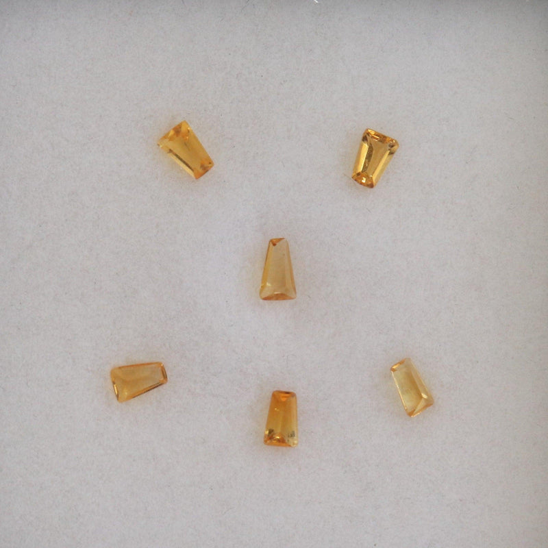 0.05ct Approc Citrine Tapered Baguette Stone - cape diamond exchange