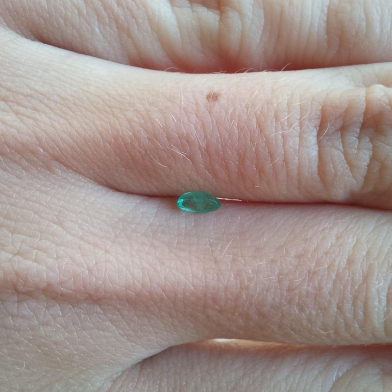 0.17ct Emerald Marquise Stone with finger view - cape diamond exchange