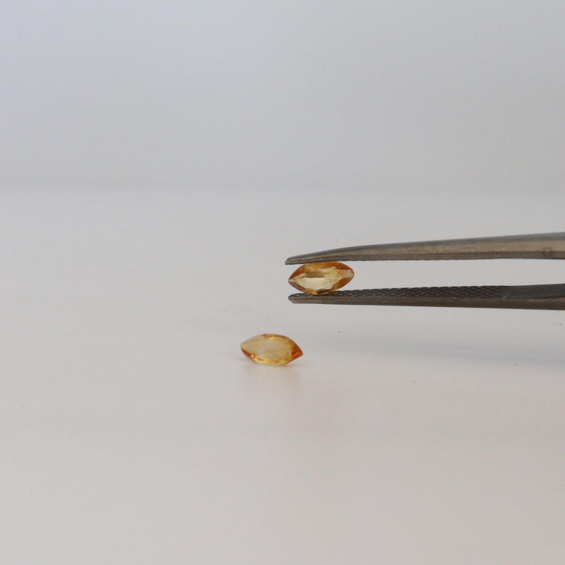 0.20ct Marquise Citrine Stone with tweezer view - cape diamond exchange