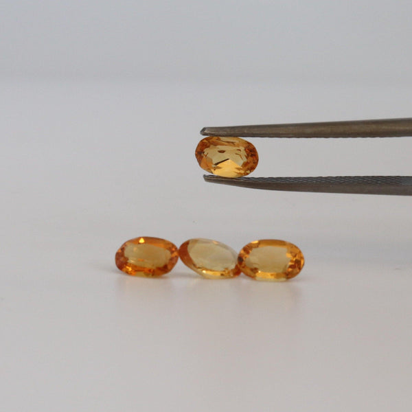 0.42ct Oval Citrine Stone with front view - cape diamond exchange