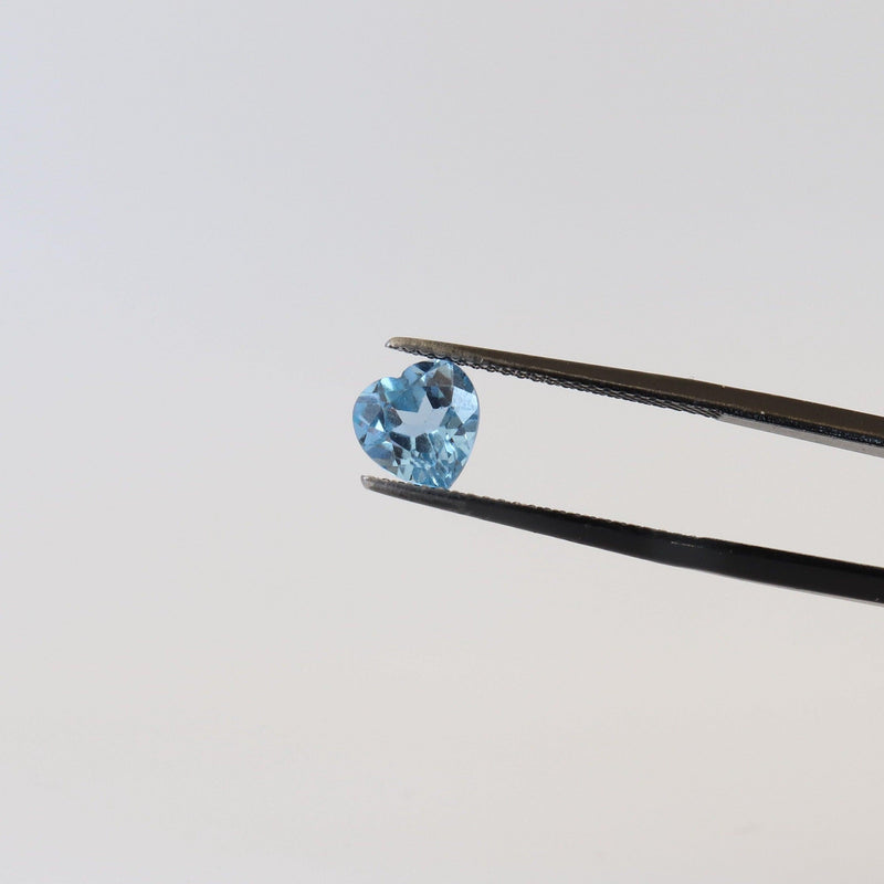 1.55ct Heart Shaped London Blue Topaz with side view - cape diamond exchange