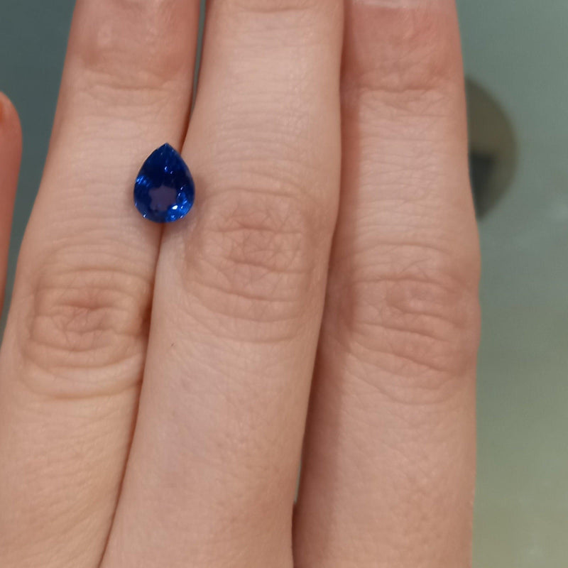 1.60ct Pear Tanzanite Stone with close up view - cape diamond exchange