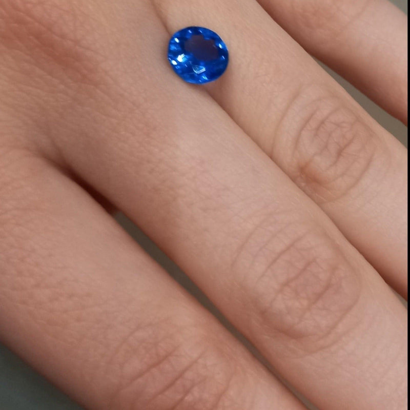 1.86ct Round Tanzanite Stone with left view - cape diamond exchange