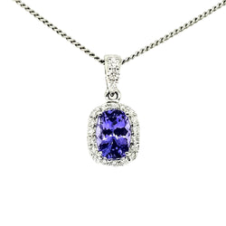 14 kt White Gold Tanzanite and Diamond Halo pendant - Cape Diamond Exchange