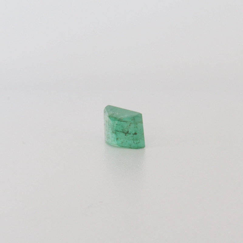 15.85ct Emerald Stone with side back view  - cape diamond exchange