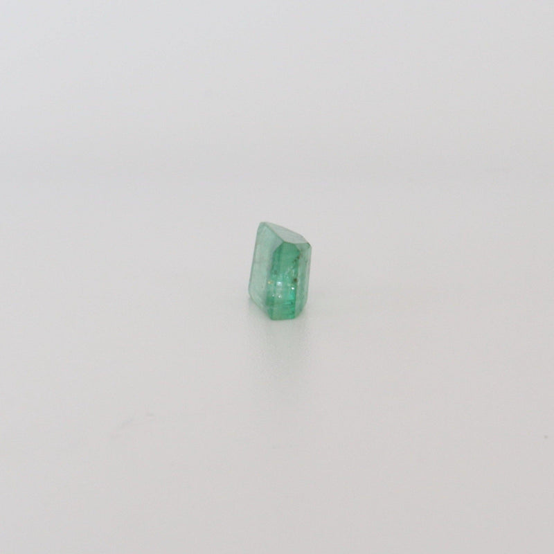 15.85ct Emerald Stone with side view - cape diamond exchange