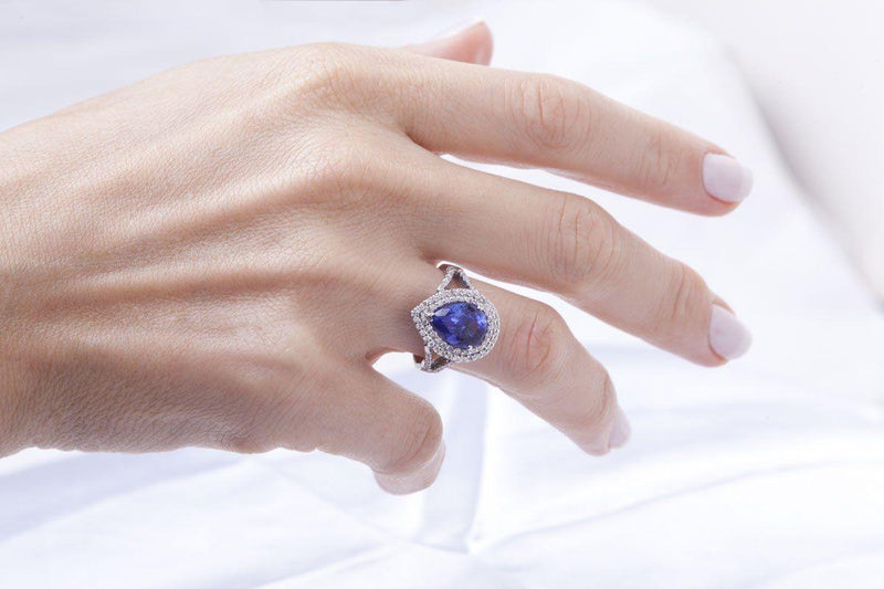 18 kt White Gold Pear Shape Tanzanite and Diamonds Halo Ring - Cape Diamond Exchange