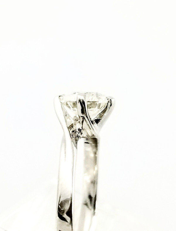 Solitaire Diamond set in a Twirling Setting White Gold Ring - Cape Diamond Exchange