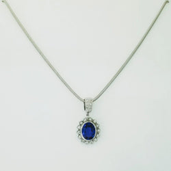 18kt White Gold Oval Tanzanite and Diamond Pendant - Cape Diamond Exchange