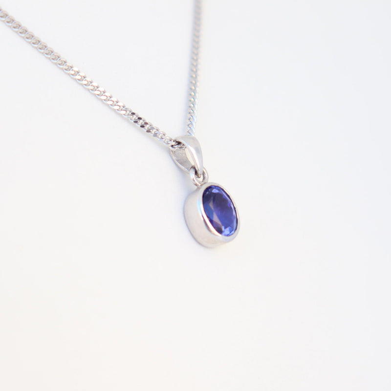 Oval Bezel set Tanzanite in White Gold