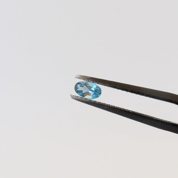 3mmx5mm Oval London Blue Topaz with front view - cape diamond exchange