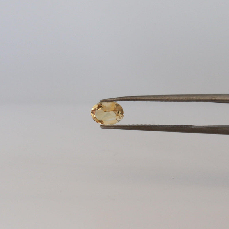 4.7mmx6.9mm Oval Citrine Stone with  front view - cape diamond exchange