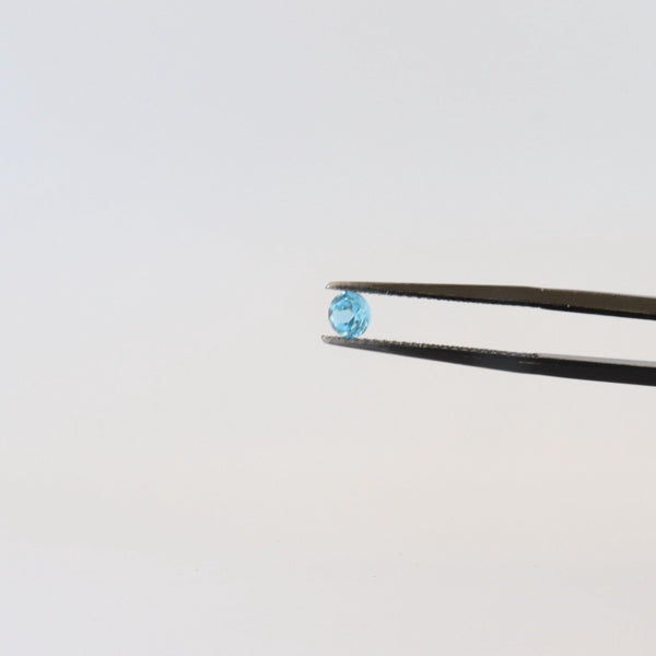 4mm Round Swiss Blue Topaz Stone with front view - cape diamond exchange