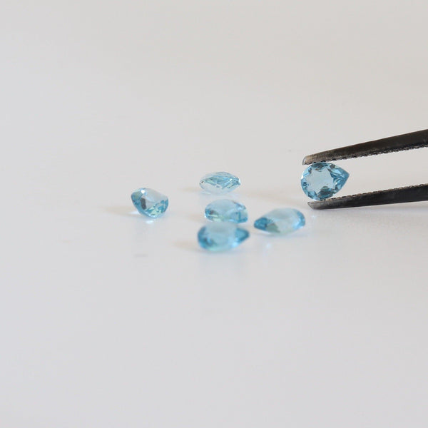 4mmx3mm Sky Blue Topaz Pear Shape Stone with front view - cape diamond exchange