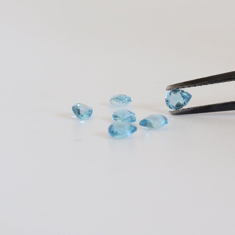 4mmx3mm Sky Blue Topaz Pear Shape Stone with front view - cape diamond exchange