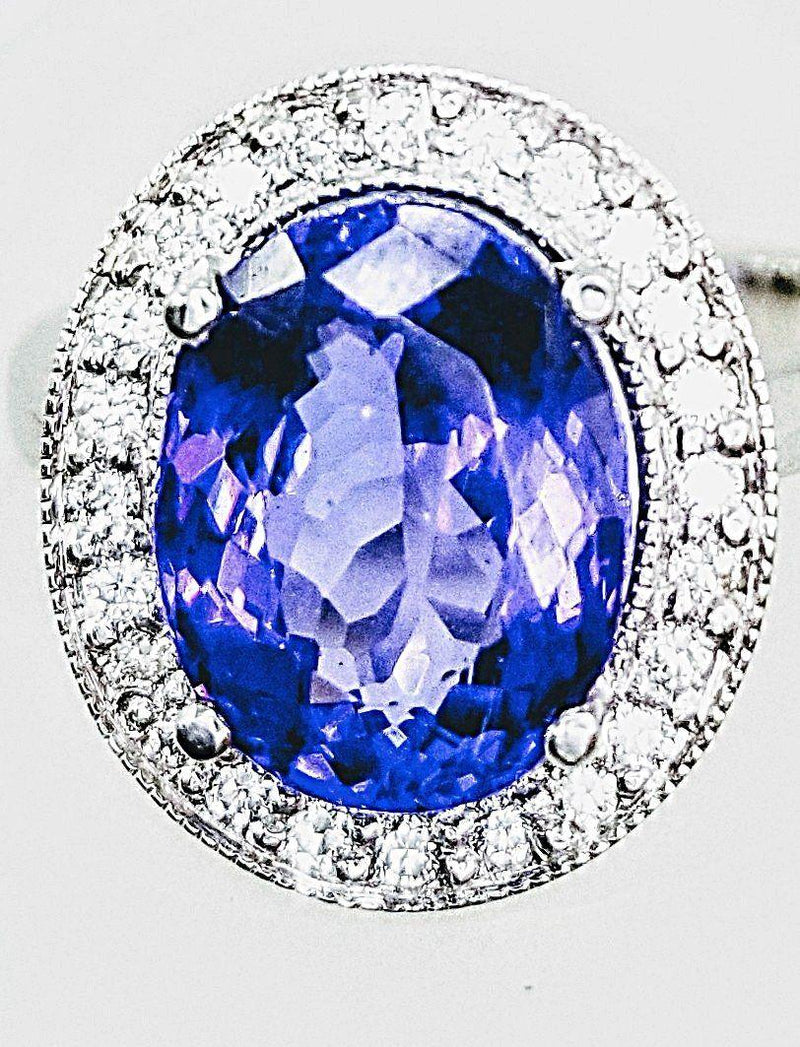 18kt White Gold Halo Oval Tanzanite Ring with Diamonds - Cape Diamond Exchange