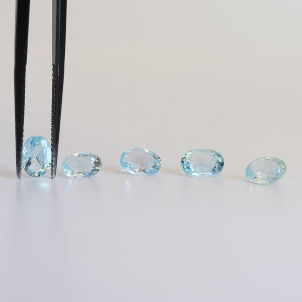 5mmx7mm Sky Blue Oval Topaz Stone with front view - cape diamond exchange