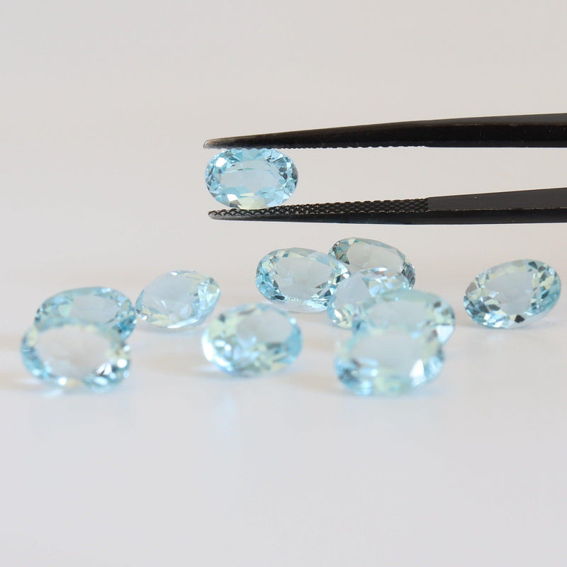 8mmx6mm Sky Blue Oval Topaz Stone with front view - cape diamond exchange