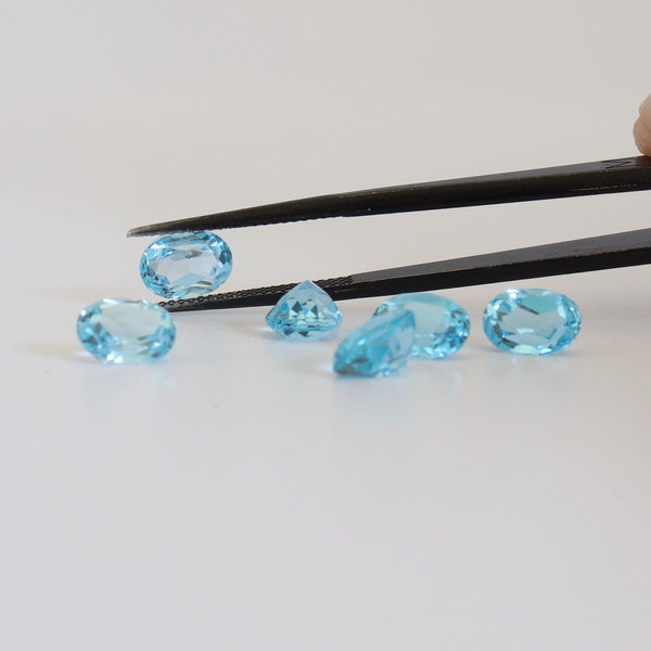 8mmx6mm Swiss Blue Oval Topaz with front view - cape diamond exchange