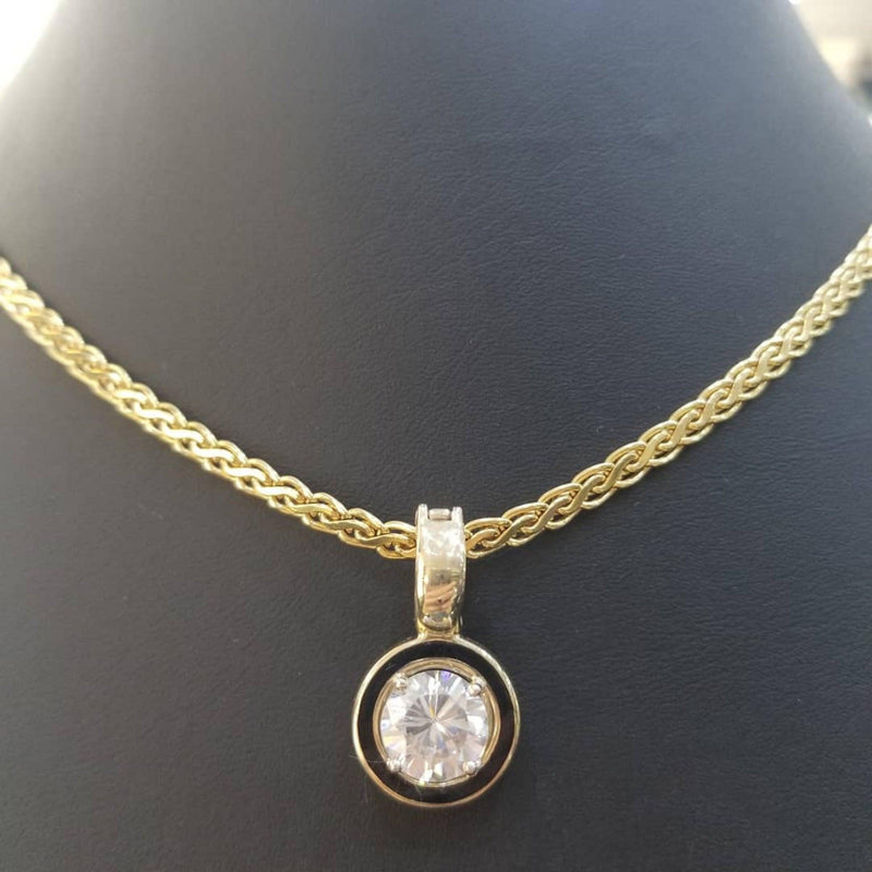 9 kt Yellow Gold pendant with a Cubic Zirconia