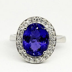 18kt White Gold Halo Oval Tanzanite Ring with Diamonds - Cape Diamond Exchange