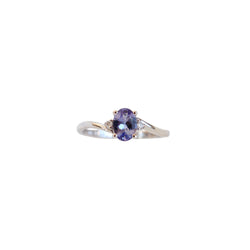 White Gold Twist Ring with an Oval Tanzanite and Diamonds - Cape Diamond Exchange