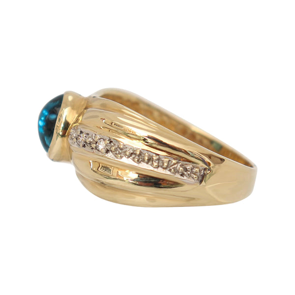 9 kt Yellow Gold Blue Topaz and Cubic Zirconia Ring
