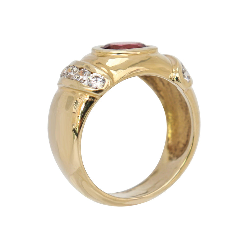 Fancy Dress Ring in 9 kt Yellow Gold Oval Garnet and Cubic Zirconias