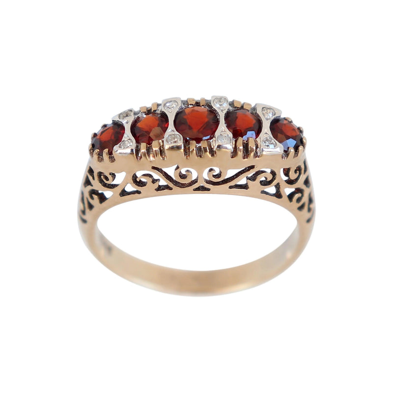Fancy Oval Garnet and Diamond Ring set in Yellow Gold