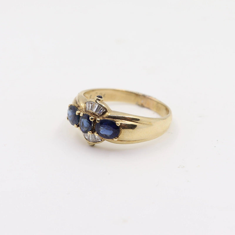 Natural Blue Sapphires set in Yellow Gold with Baguette Cut Diamonds