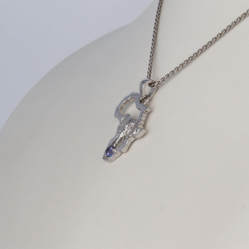 African outline with Elephant and Tanzanite left view - cape diamond exchange