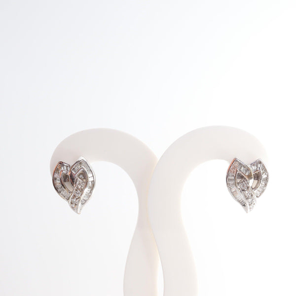 18kt White Gold  Heart shaped baguette diamond earrings	front view - cape diamond exchange				