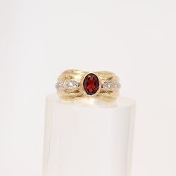 9 kt Yellow Gold Oval Garnet Ring - at Cape Diamond Exchange