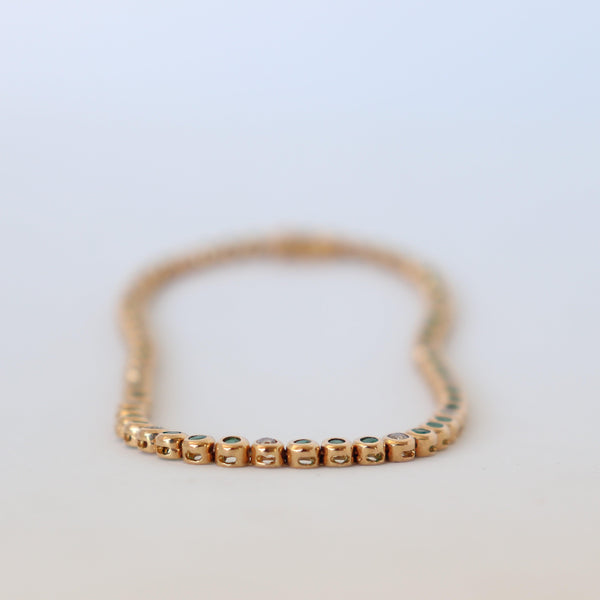 Tennis Bracelet with diamonds and Emeralds at Cape Diamond Exchange