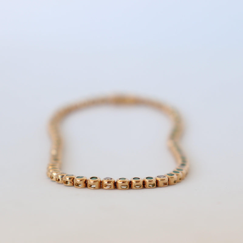 Tennis Bracelet with diamonds and Emeralds at Cape Diamond Exchange