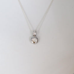 Platinum doughnut pendant with a diamond - Cape Diamond Exchange