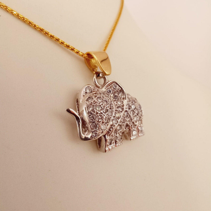 White and Yellow Gold Elephant with diamonds - cape diamond exchange