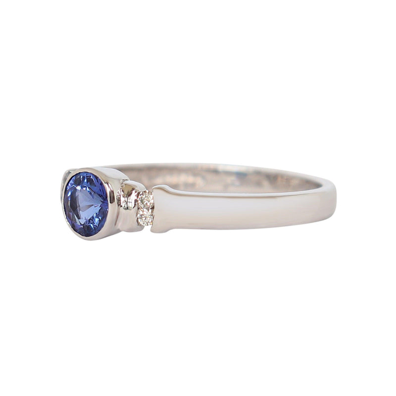 18 kt White Gold Bezel-set Tanzanite and Diamond Ring - Cape Diamond Exchange