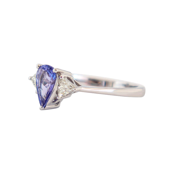 Trilogy Ring with a Pear Tanzanite and Trillion Diamonds